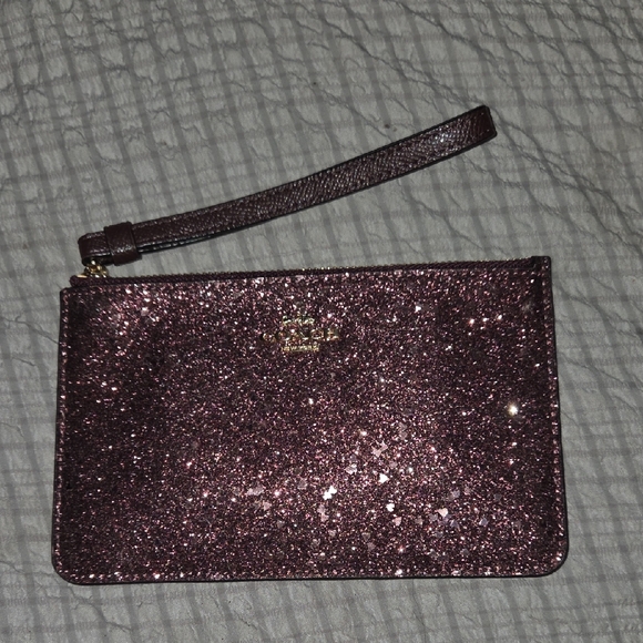 Coach Handbags - COACH BURGUNDY STAR GLITTER WRISTLET GENTLY USED CONDITION